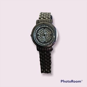 Gun metal grey diamond beveled face watch.